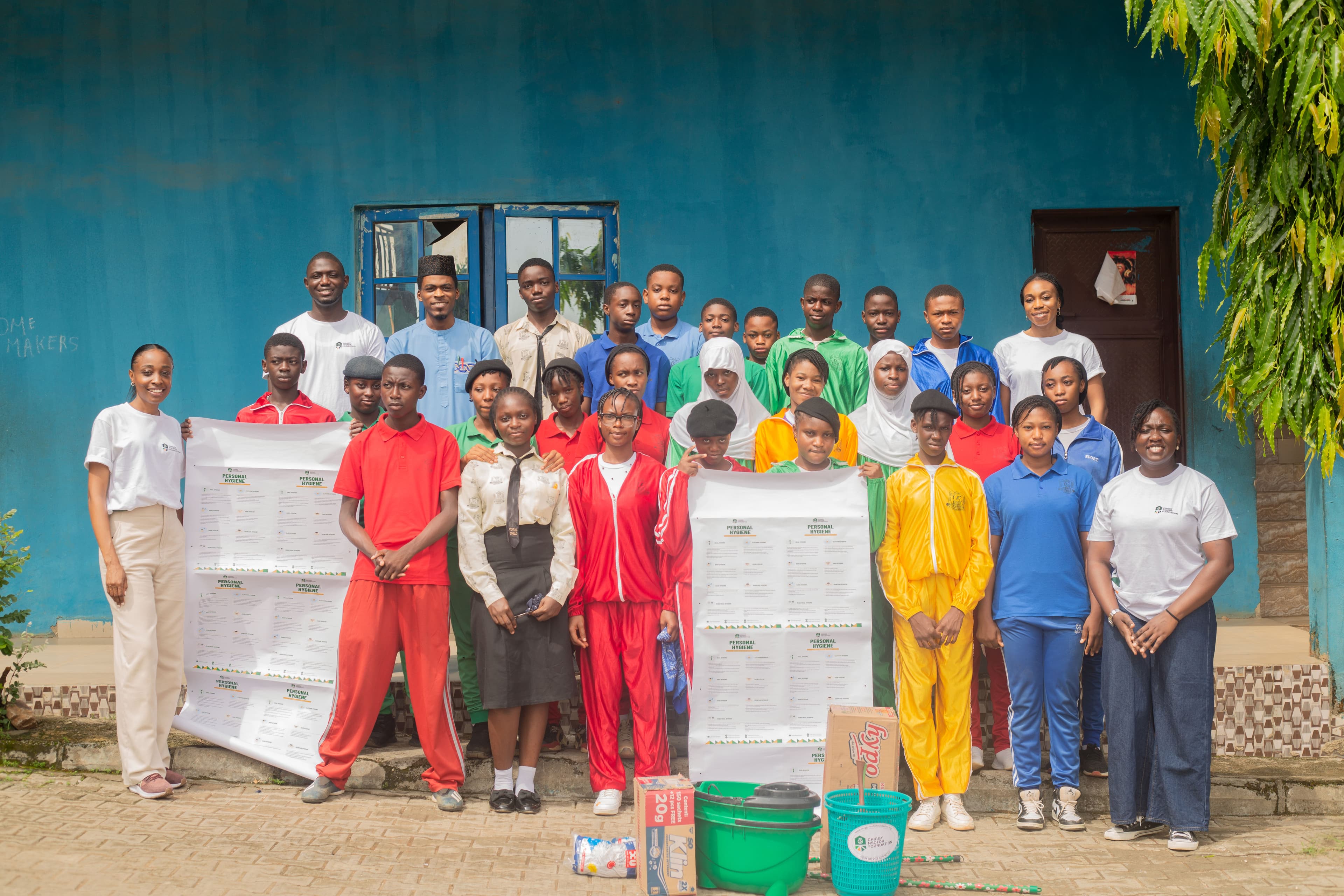 Students and CNF team celebrating a personal hygiene and community health outreach