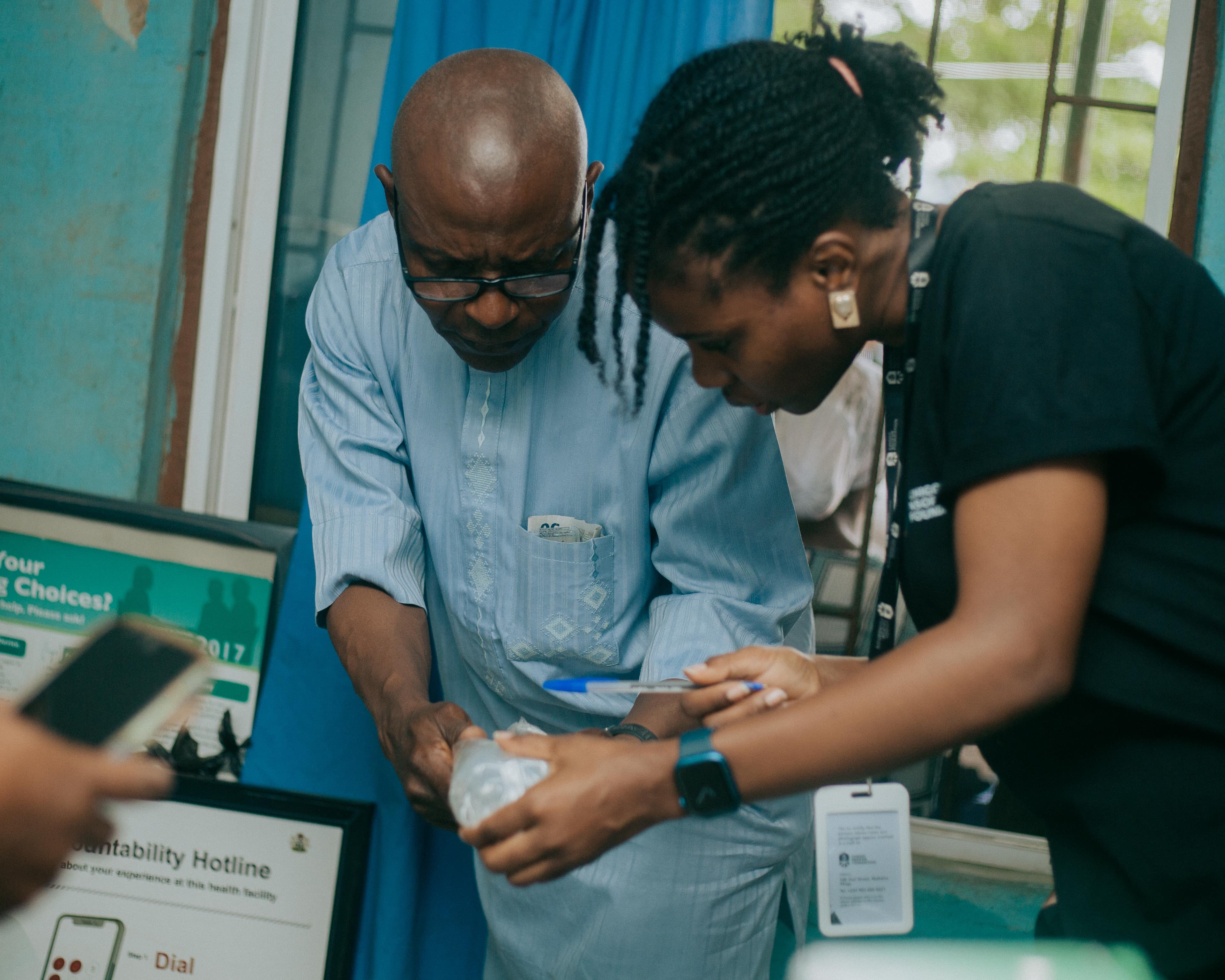 CNF team member supporting a patient during a community healthcare outreach
