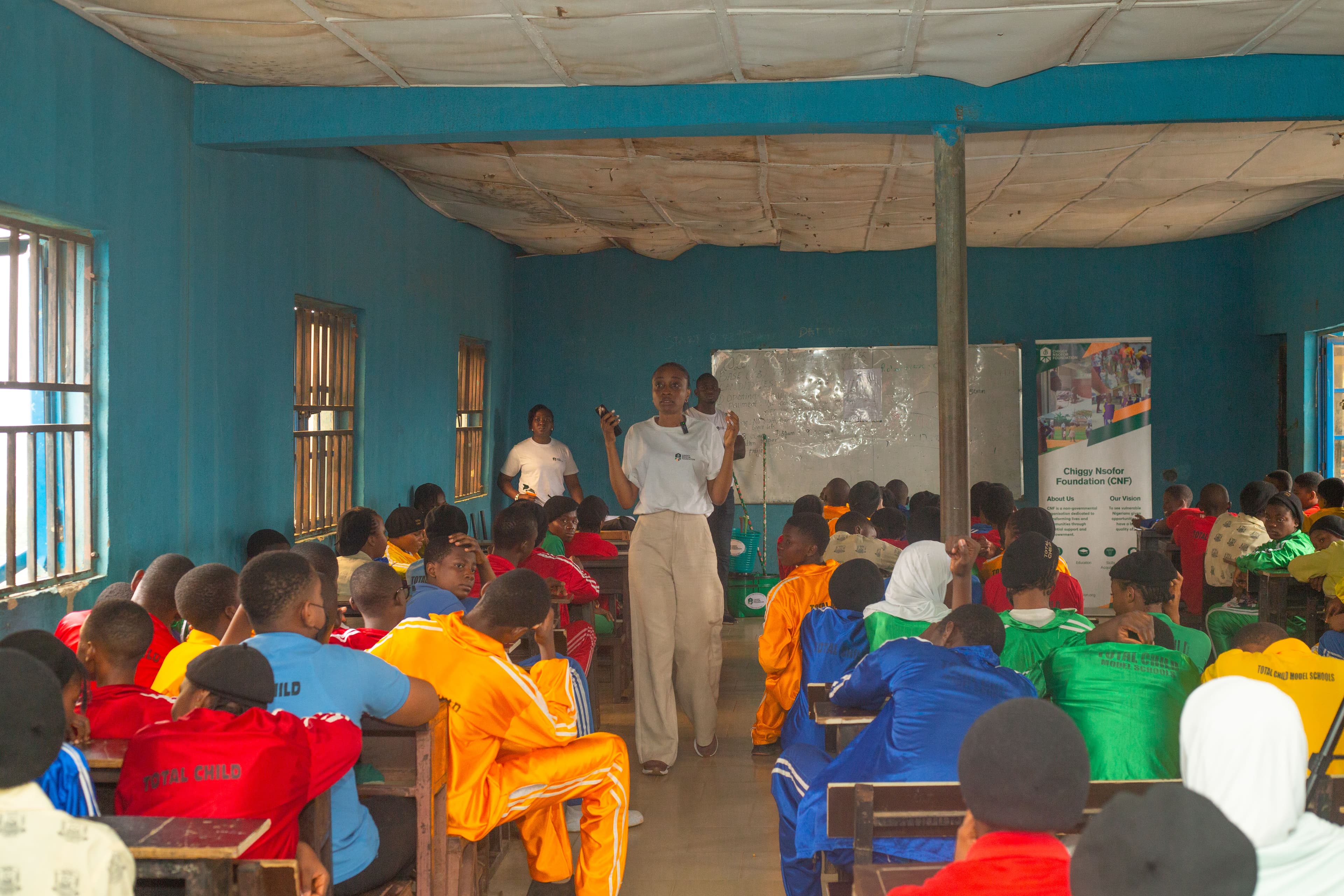 CNF facilitator leading a classroom session with students in partner schools