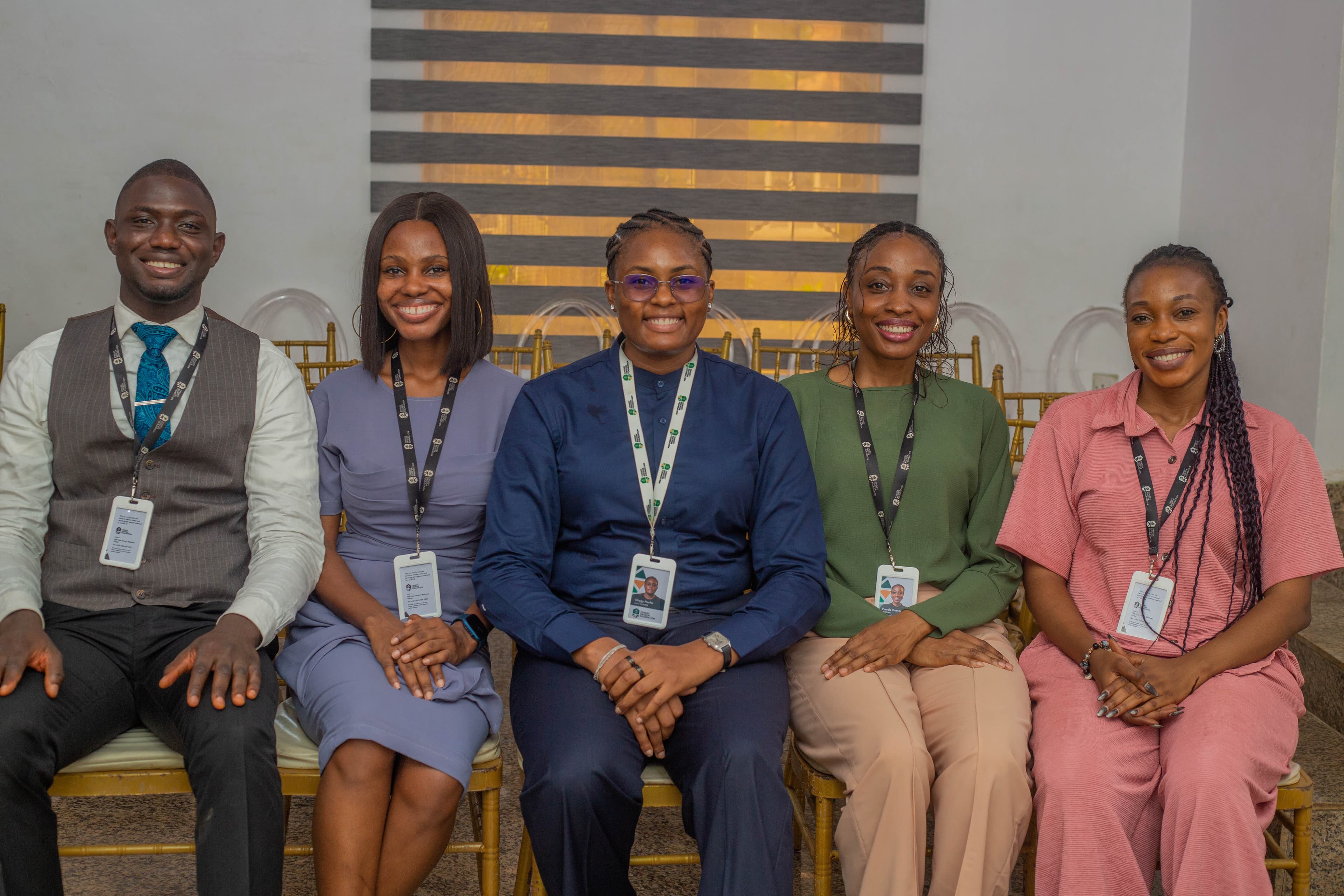 Chiggy Nsofor Foundation team seated together in professional portrait